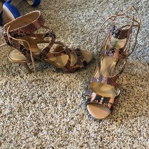 Gianni Bini snake print heels.